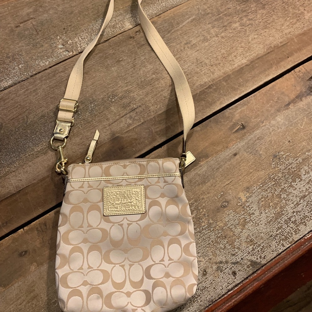Coach light tan crossbody purse